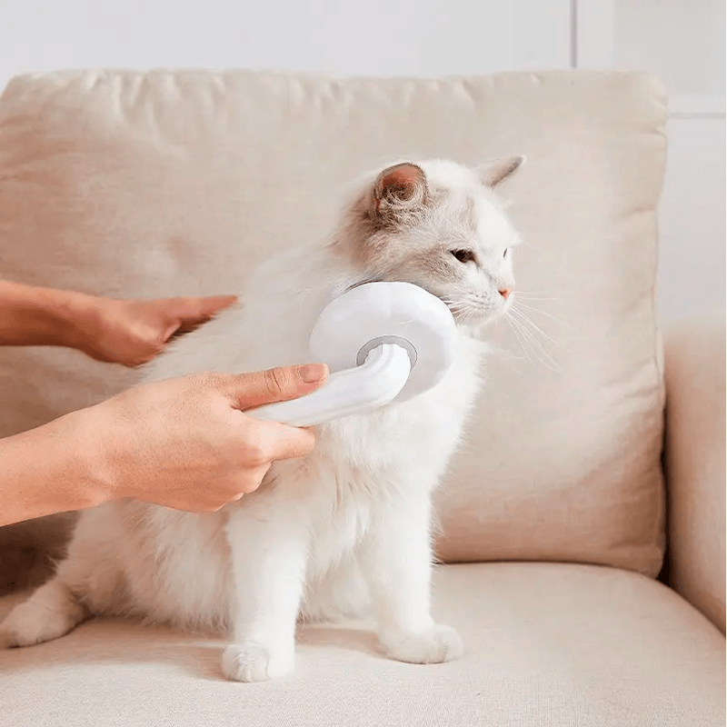 Peine Cepillo Quita Pelusa con Expulsador para Mascotas Rosado