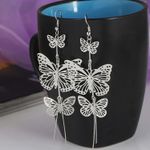Aretes-largos-mariposas-plateadas