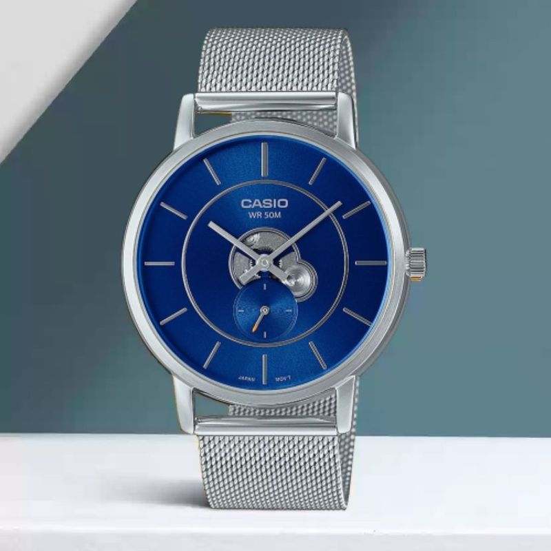 Reloj-Analogo-Casio-Original-Regular-MTP-B130M-2A-Hombre-Acero-Plateado-y-Azul