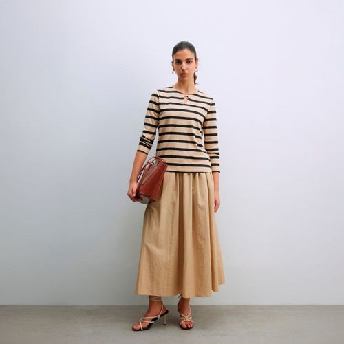 Polo Mujer Sfera Estampada Marrón