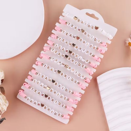 Set x 12 pulseras para novia y el team bride despedida de soltera blanco y rosa bride team bride